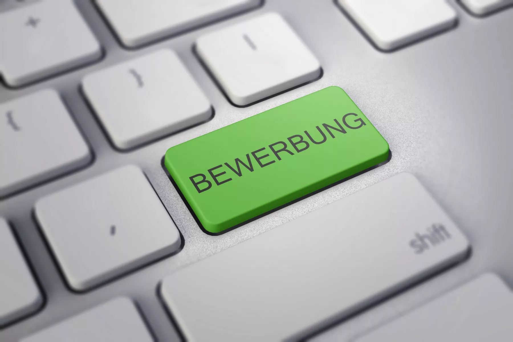 Eine Tastatur mit einem Button "Bewerbung".
